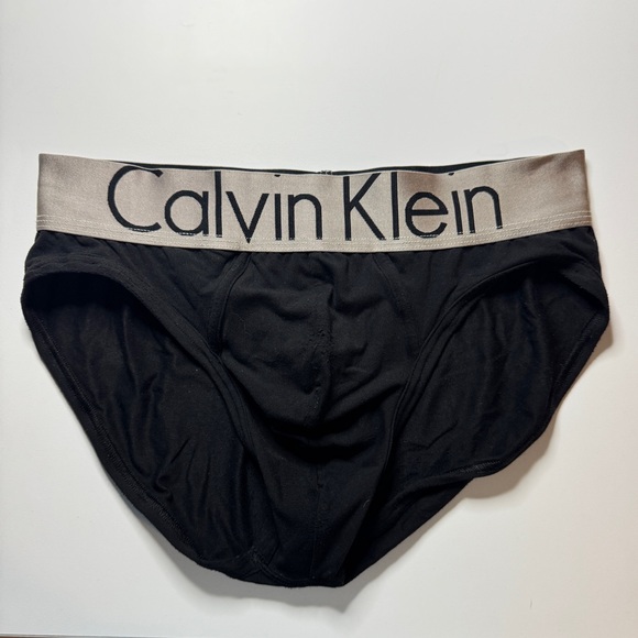 Calvin Klein Men's Steel Micro Hip Briefs in Black with Gray Waistband - Picture 1 of 5